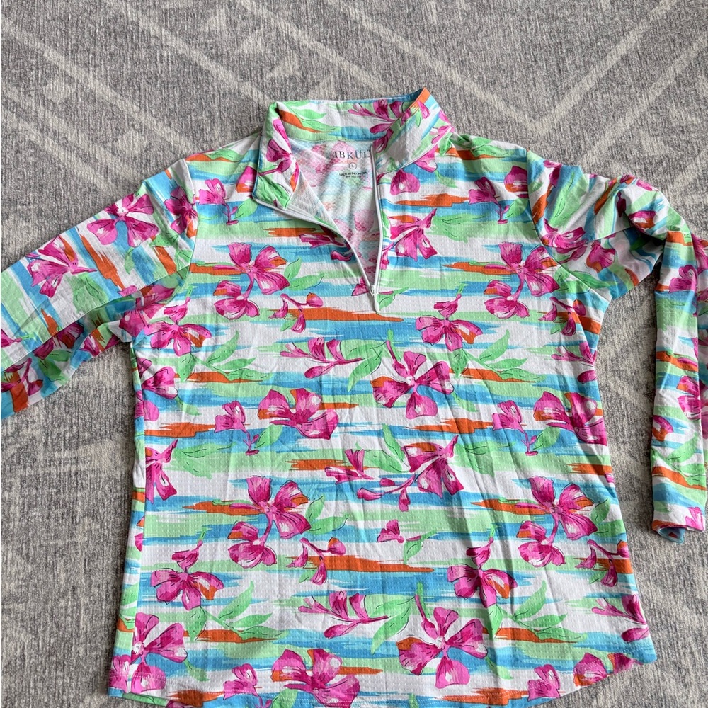 IBKUL Pink Floral 1/4 zip with mesh under sleeves classy golf sun protection